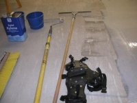 garage epoxy coat half done 4.JPG