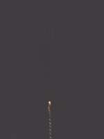 in the dark looking up at the gap from outside lightened blocker door closed.jpg