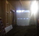 rear garage door being installed.JPG