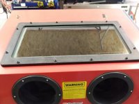 Glass surround with new screws + rivet nuts.jpg